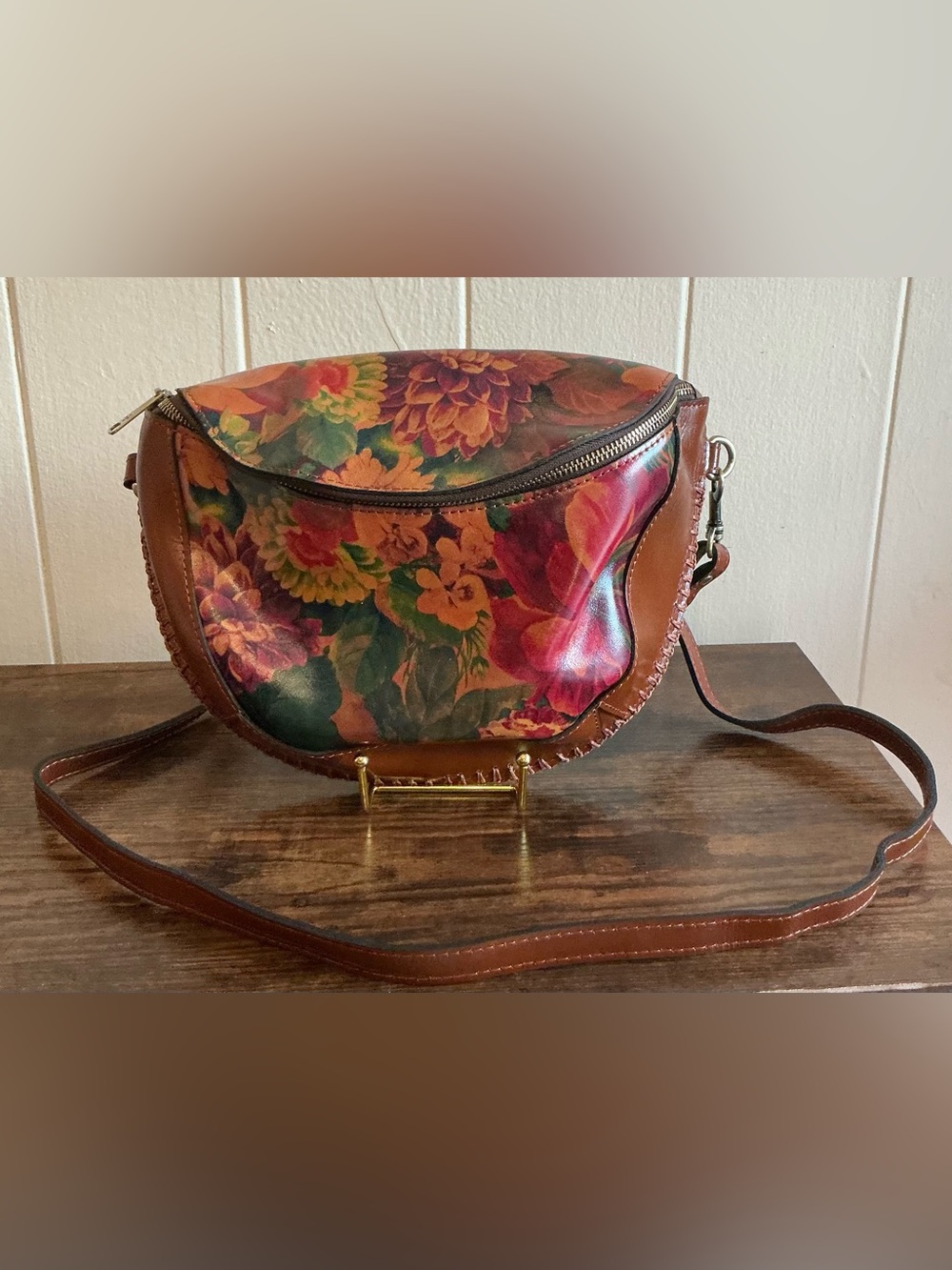 the Patricia Nash "Tinchi" Leather Convertible Belt Bag / Crossbody Sling